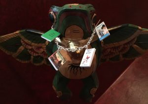 Stephanie gifted me with a charm bracelet, the charms are my book covers with one titled: My Next Book! I hung it on my flying frog (Orville from Waterwight) above my red room work space!